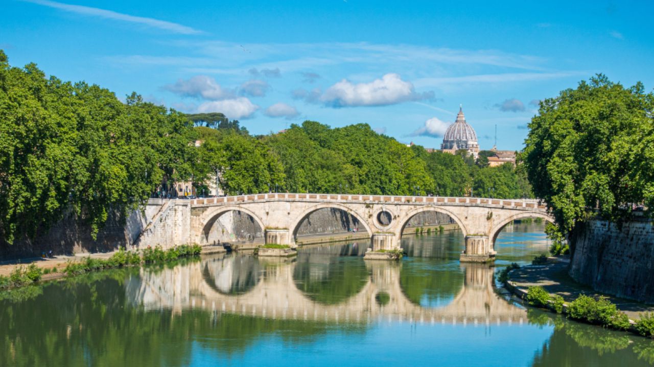 Beautiful view from Ponte Sisto in Rome, with the Saint Peters Basilica dome in the background. Italy.